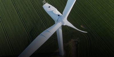 The cloud helps companies reduce energy usage to manufacture products Stock image of wind turbine