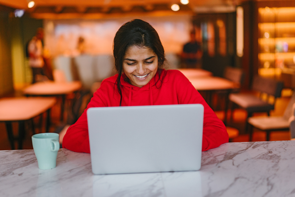 student working at a laptop