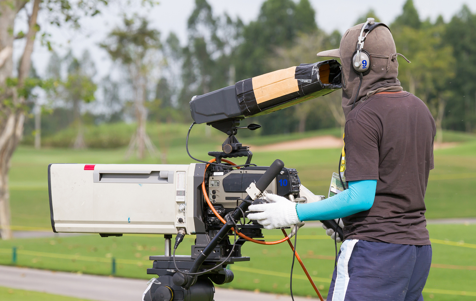 Cameraman live playing golf in golf course.