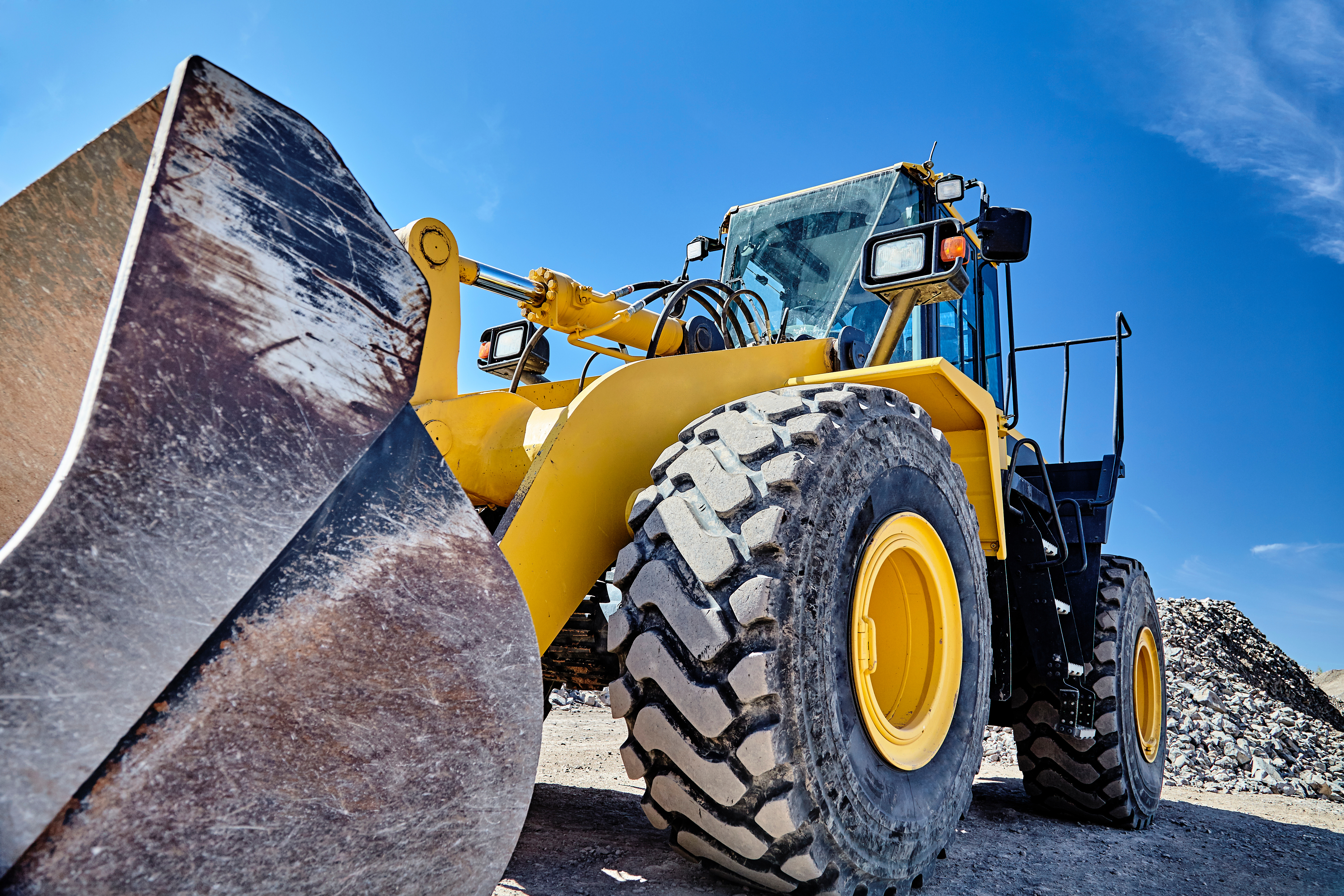 Heavy equipment machine wheel loader on construction jobsite