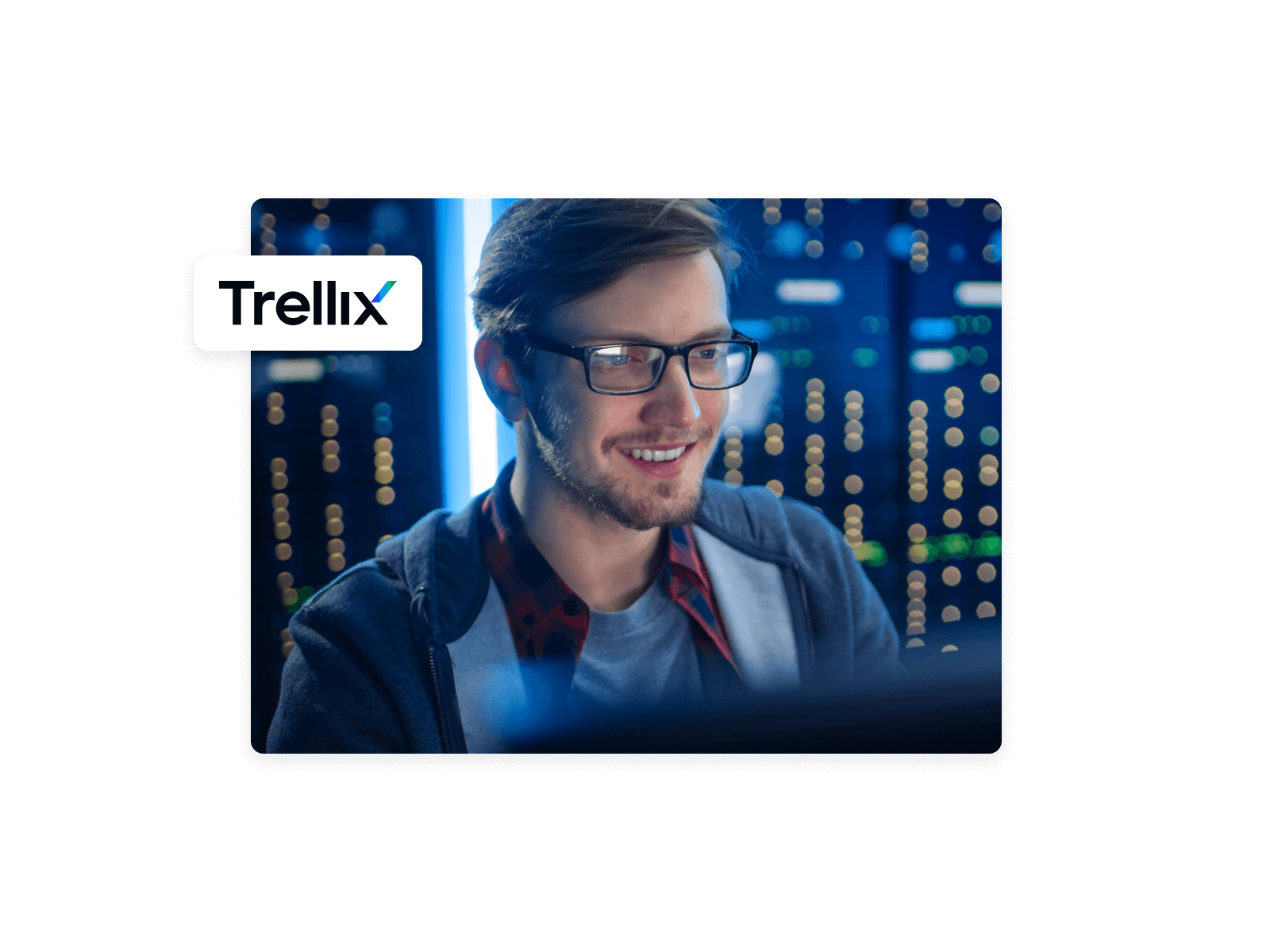 Trellix user smiling at a computer screen.