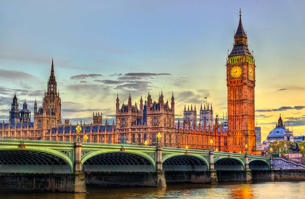 The Palace and the Bridge of Westminster in London at sunset - the United Kingdom