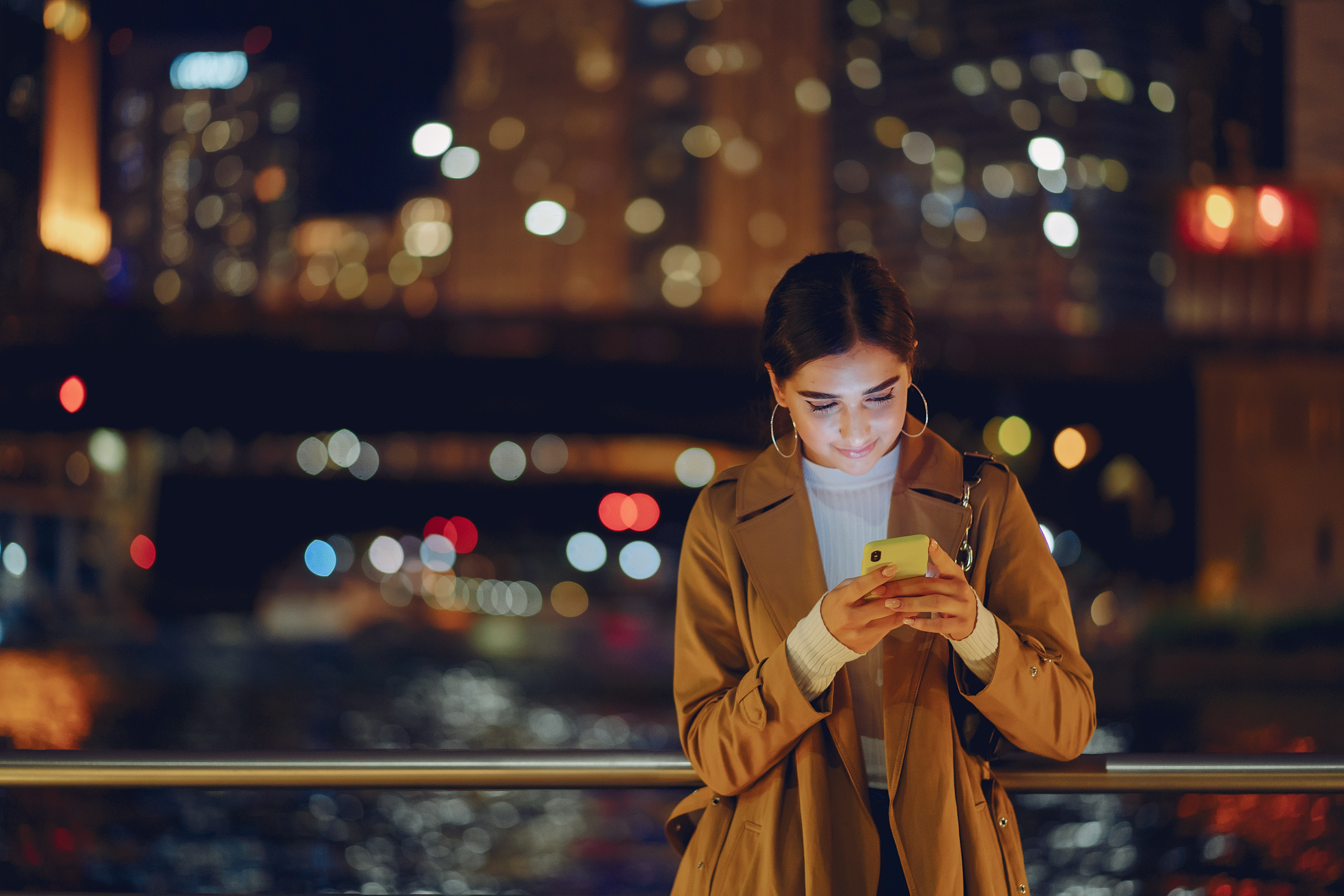 girl at night with phone