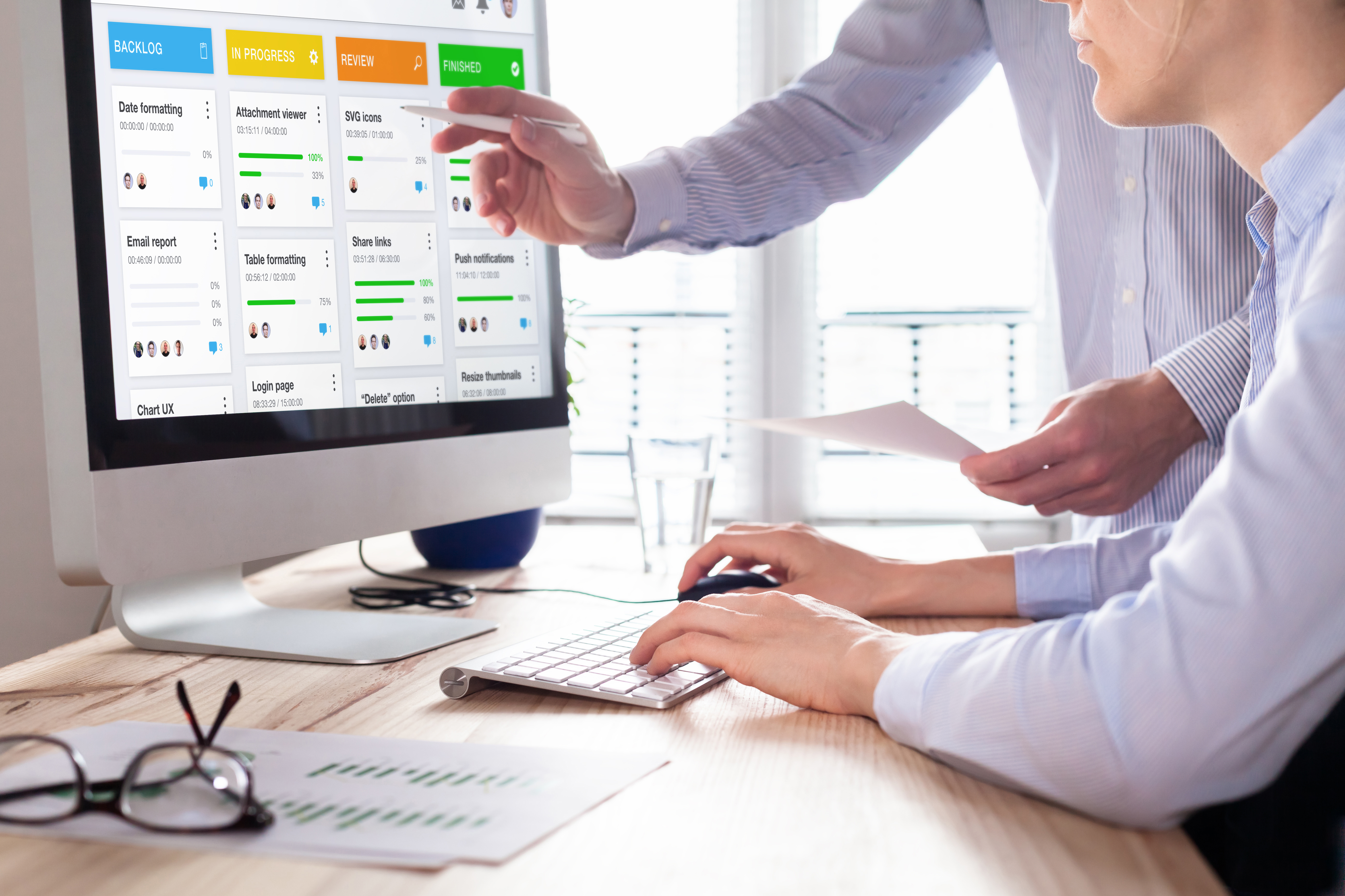 Colleagues working on agile product development board with scrum or kanban framework, lean methodology, iterative or incremental organization project management strategy for startup or software design