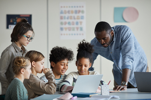 Kids Looking at Computer Screen in School