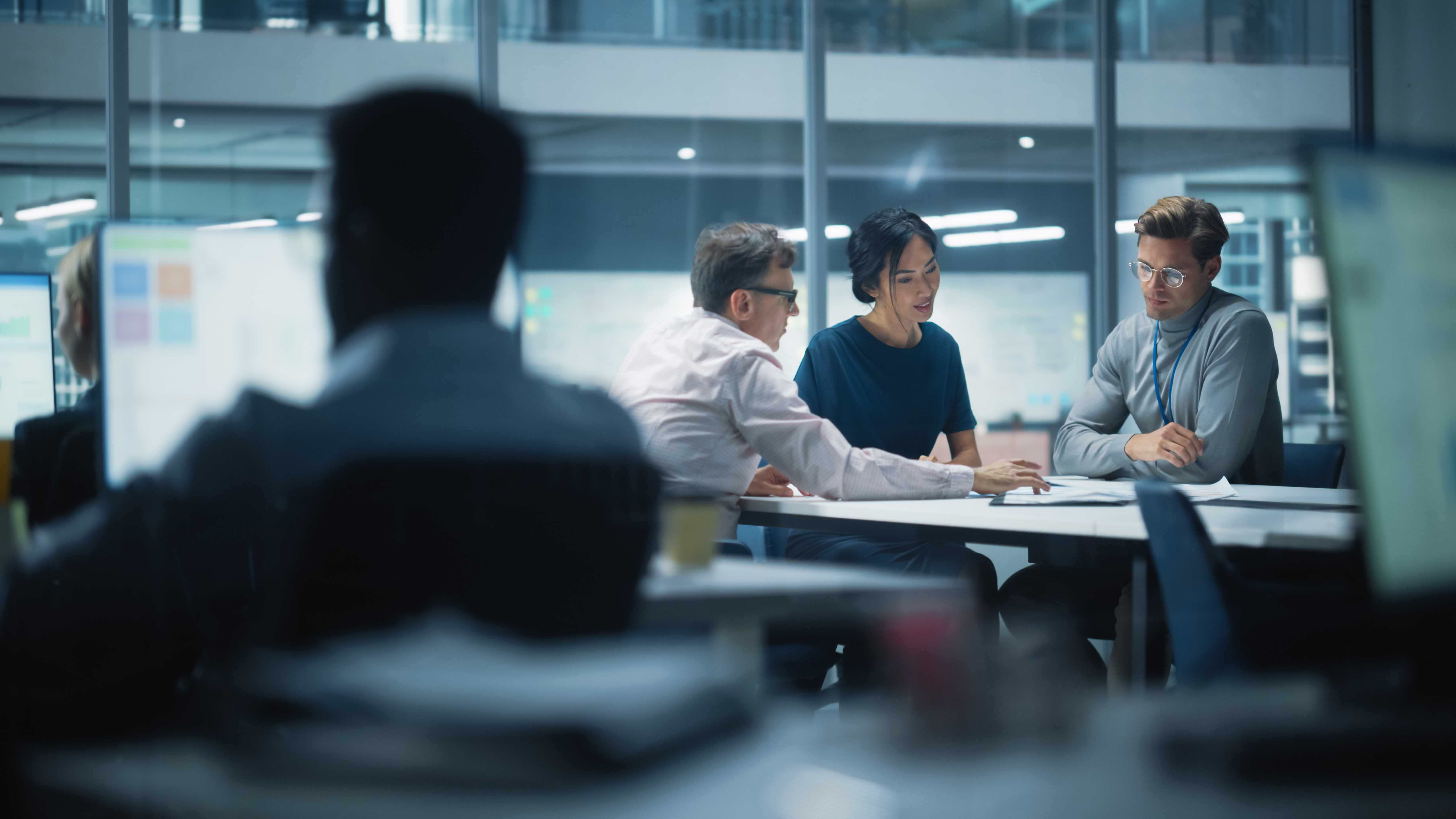 Diverse Team of Managers Working and Having Discussions in Modern Big City Office. Colleagues Work on New Business Opportunities, Management Board Having a Meeting, Talking About Investing in Future.