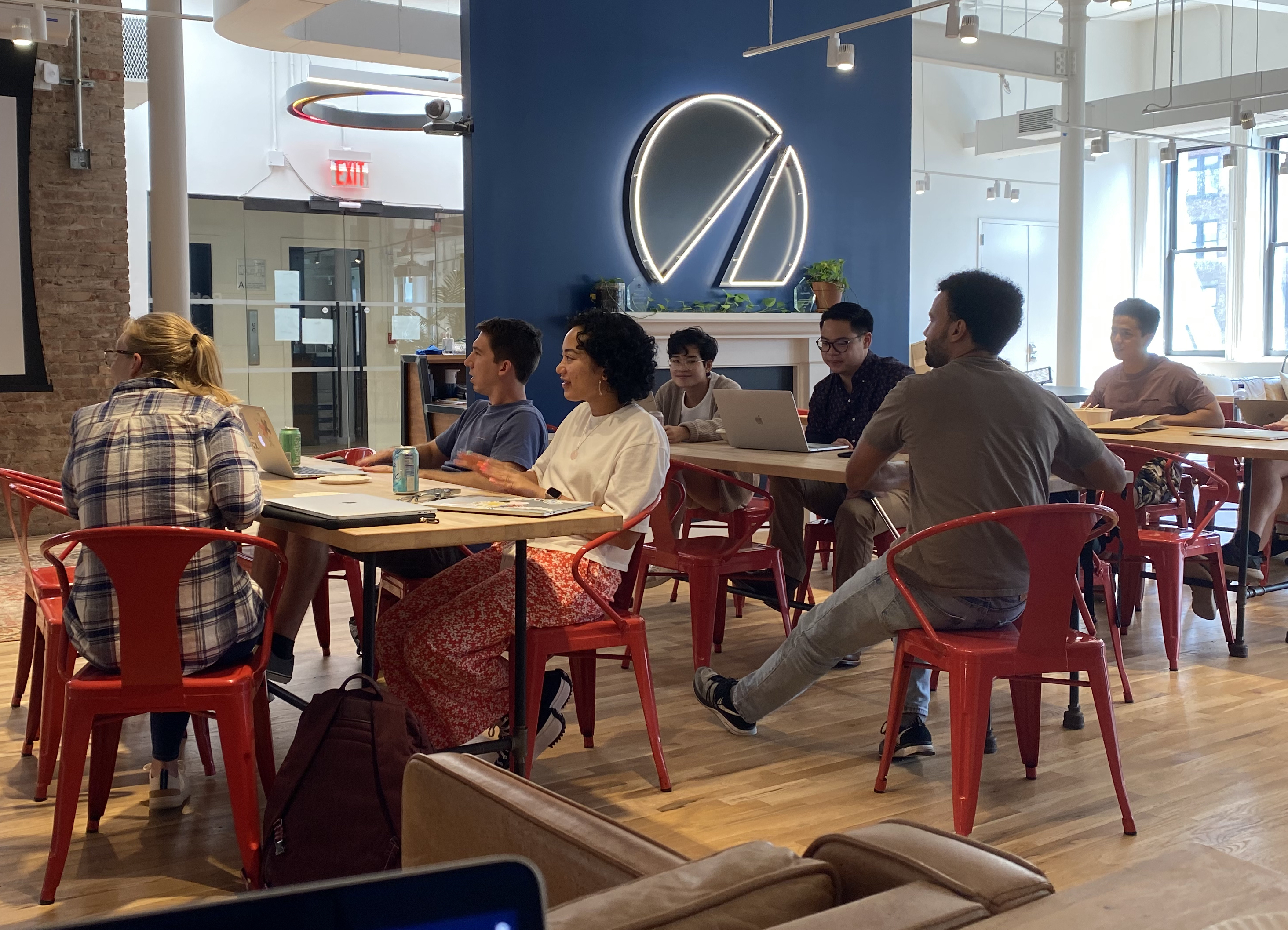 Members of the Betterment team gather for discussion.