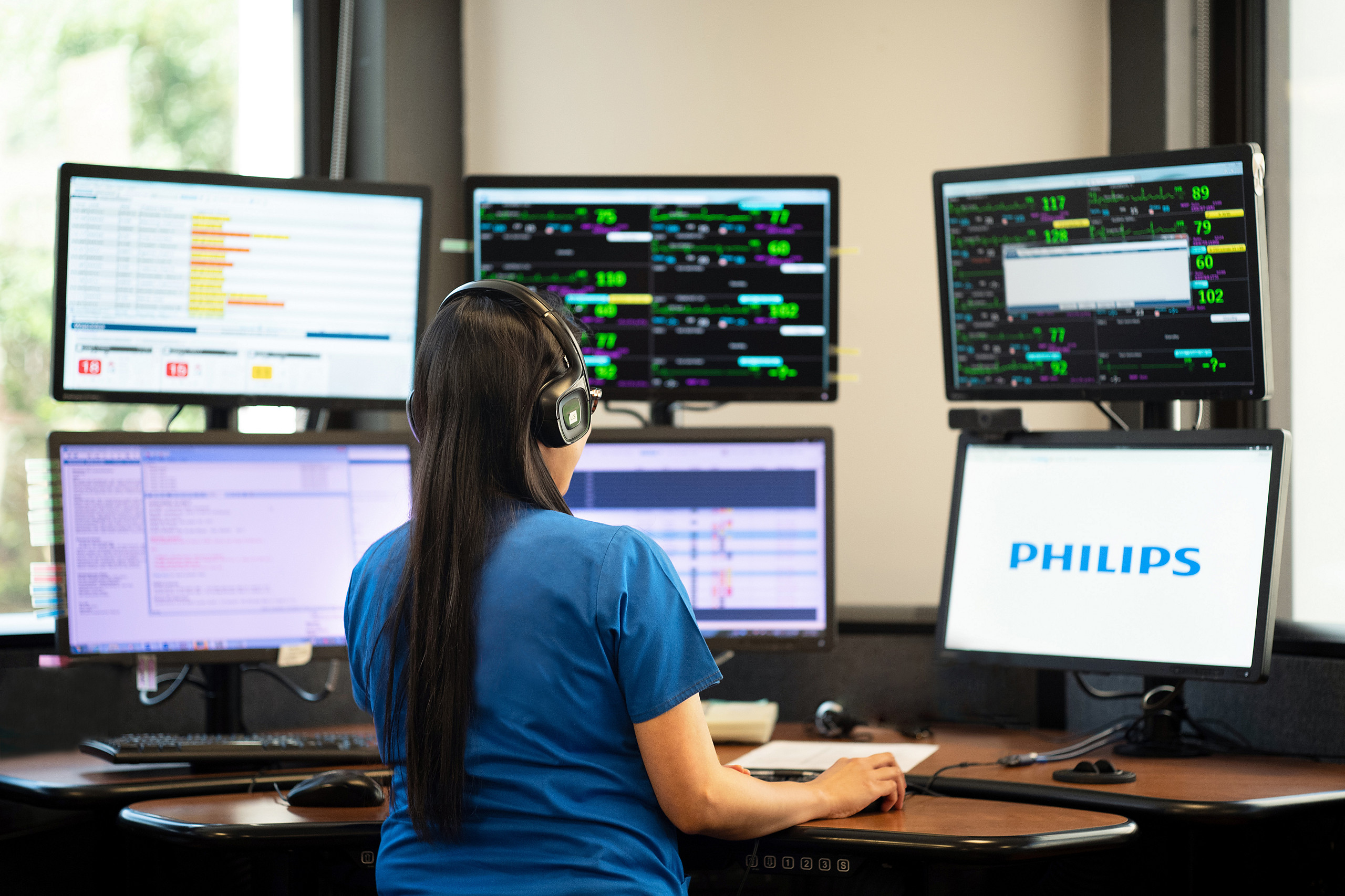 Woman on 6 monitors 