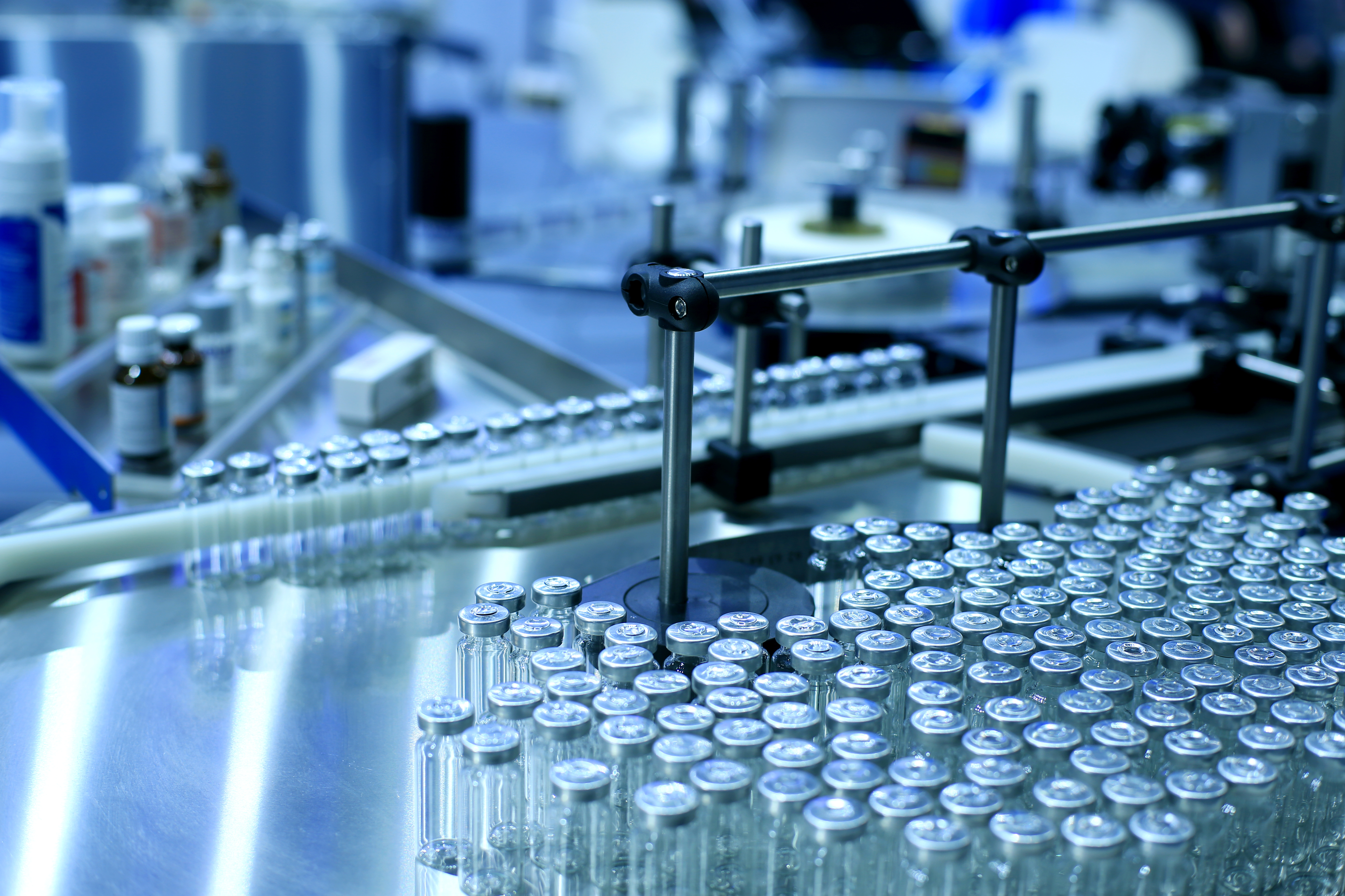 Factory for the production of medicines, glass bottles on the conveyor