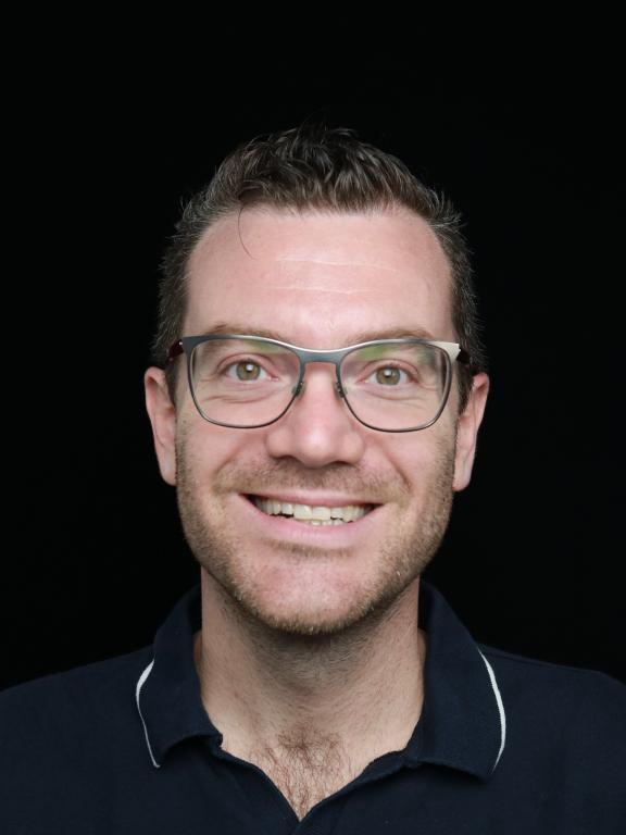 Headshot image of an Amazon employee.