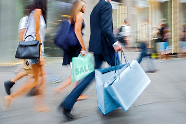 shoppers with retail bags