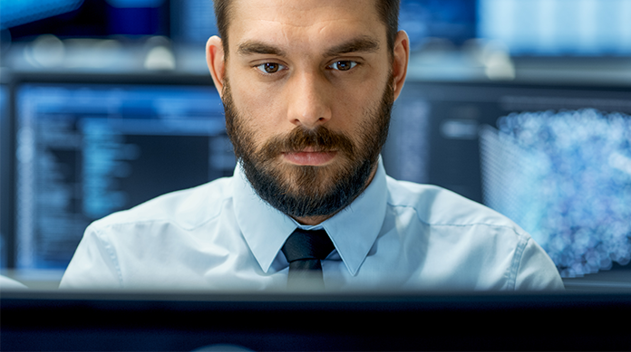 IT employee at desk