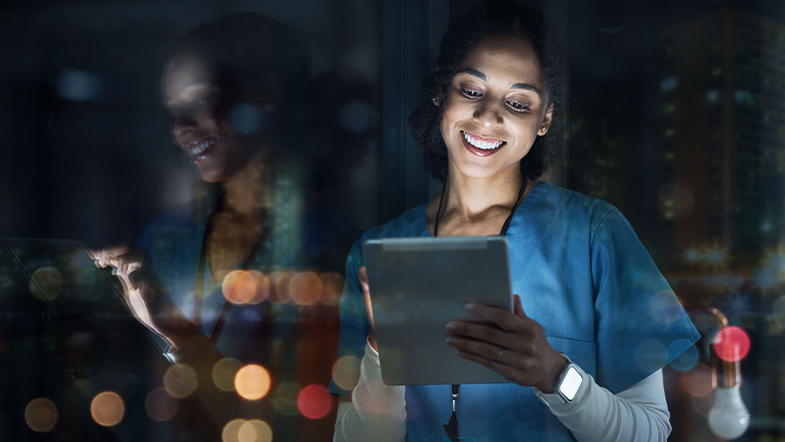 Photo of nurse holding a tablet