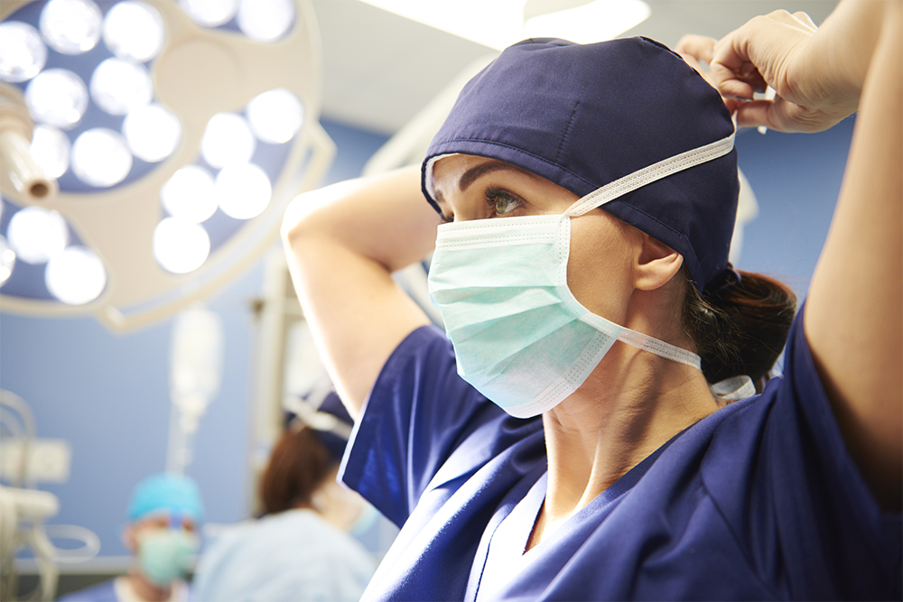 Serious doctor in medical mask and cap looking camera in 2022 Medical masks, Med