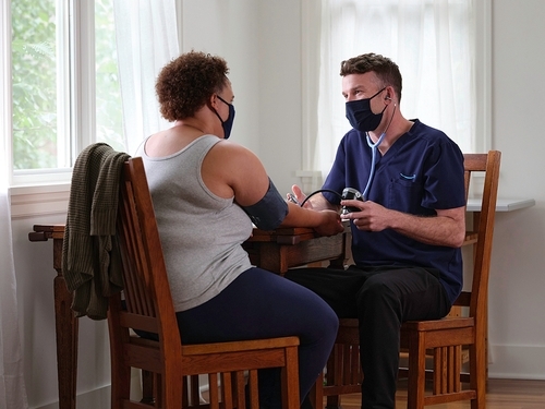 image of nurse and patient