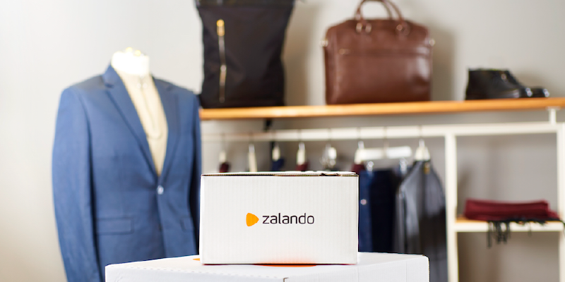 Zalando boxes on a table in a clothing store setting