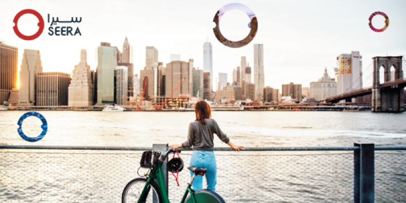 Seera stock image woman in front of skyline