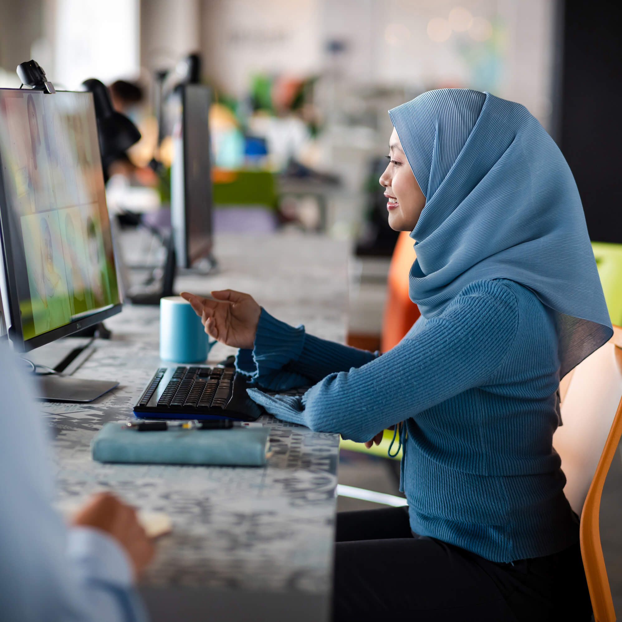 woman at desk having a video call