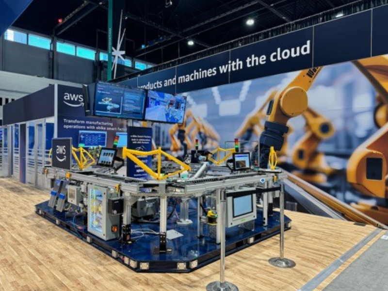 Autonomous manufacturing production line with AWS-powered robots at the IMTS booth tour