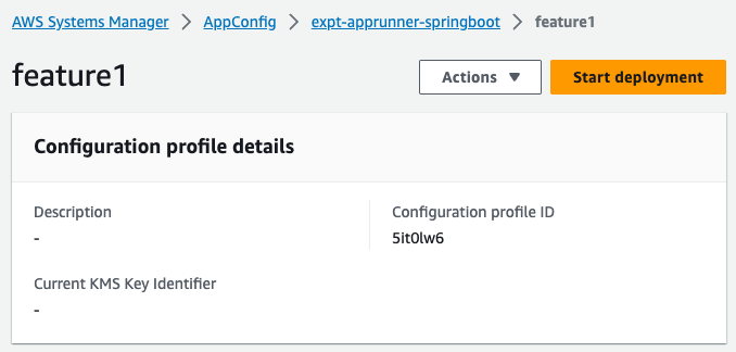 Screenshot of the AWS AppConfig interface showing configuration profile details for feature1, including profile ID, description, and KMS Key Identifier, with deployment options visible.