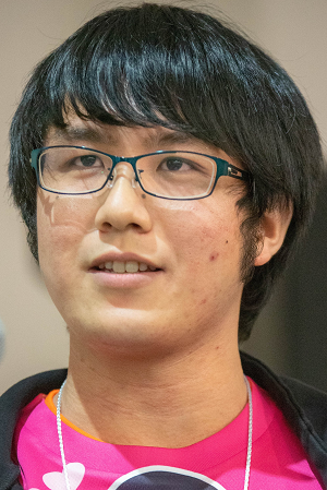 A close-up portrait of a person with glasses and a pink shirt, taken at JAWS DAYS 2019.