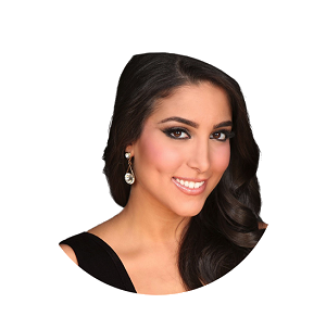 Professional headshot of a woman with long dark hair, wearing a black top and earrings, suitable for AI and machine learning related content.