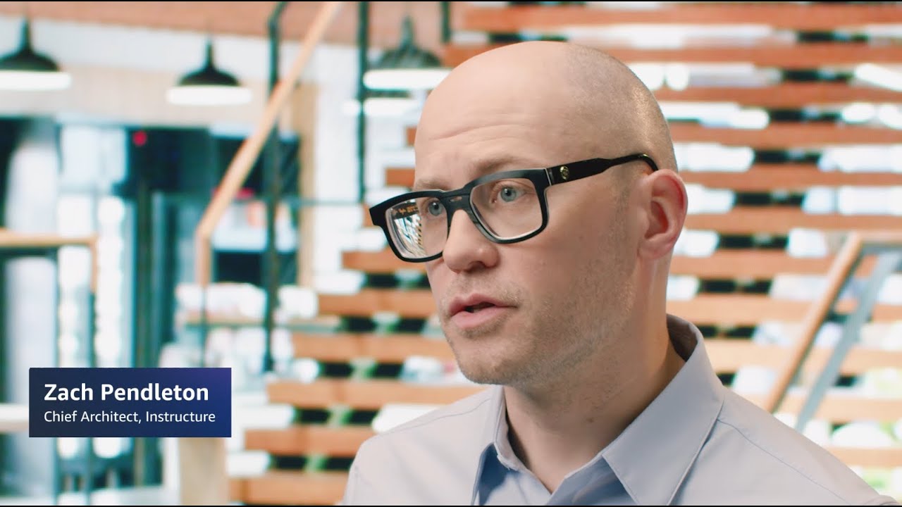 YouTube thumbnail image featuring Zach Pendleton, Chief Architect at Instructure, with a blurred modern office background.