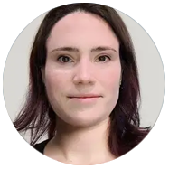 2Person with shoulder-length dark hair and a neutral background.