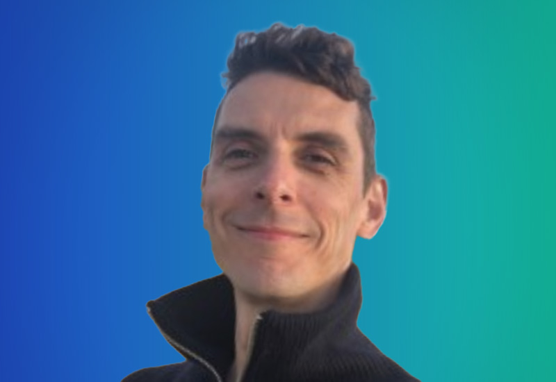 Portrait of a smiling person on a blue and green gradient background