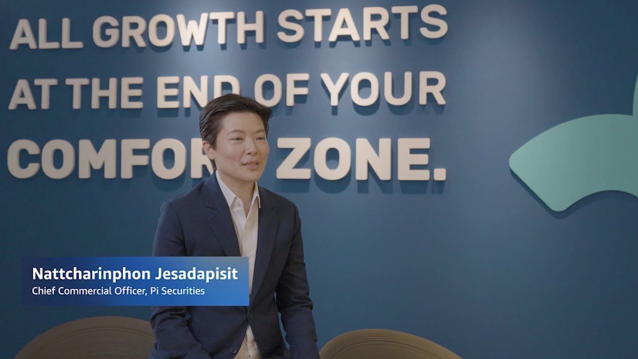 A YouTube thumbnail featuring Nattcharinphon Jesadapisit, Chief Commercial Officer of Pi Securities, sitting in front of a blue wall with the motivational quote 'All growth starts at the end of your comfort zone.'