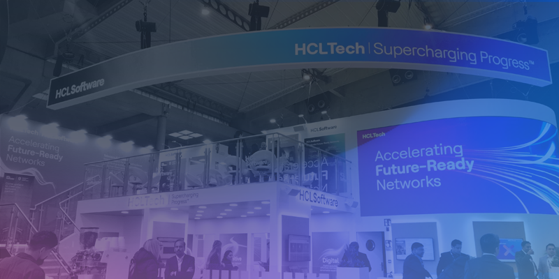 The HCLTech 'Supercharging Progress' expo booth showcasing HCL Software, with signage promoting future-ready networks, at a technology event.