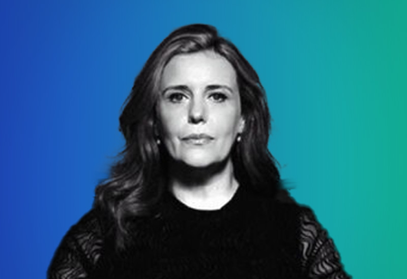 Professional headshot of an individual with long hair, set against a blue and teal gradient background. Image is used for AWS ExecLeaders Stockholm event.