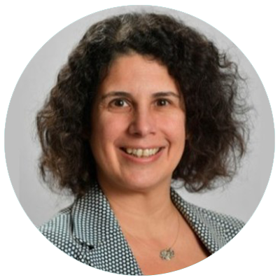 Professional headshot of Maria Pena, featuring her smiling and wearing a business suit against a neutral background.