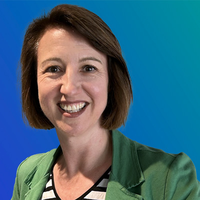 A person wearing a green blazer over a black-and-white striped shirt, set against a blue gradient background.