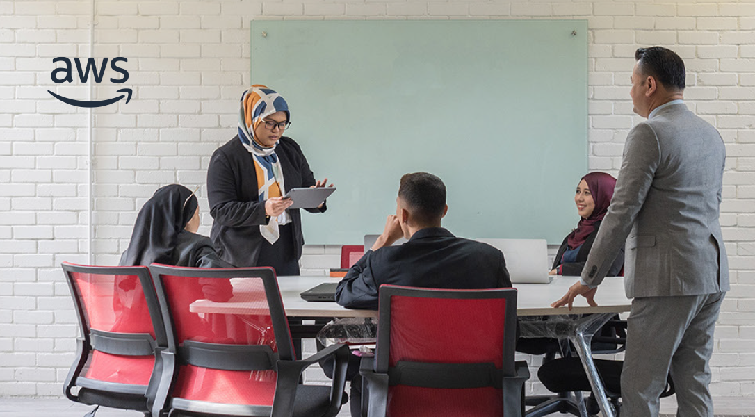 A business meeting taking place in a modern office.