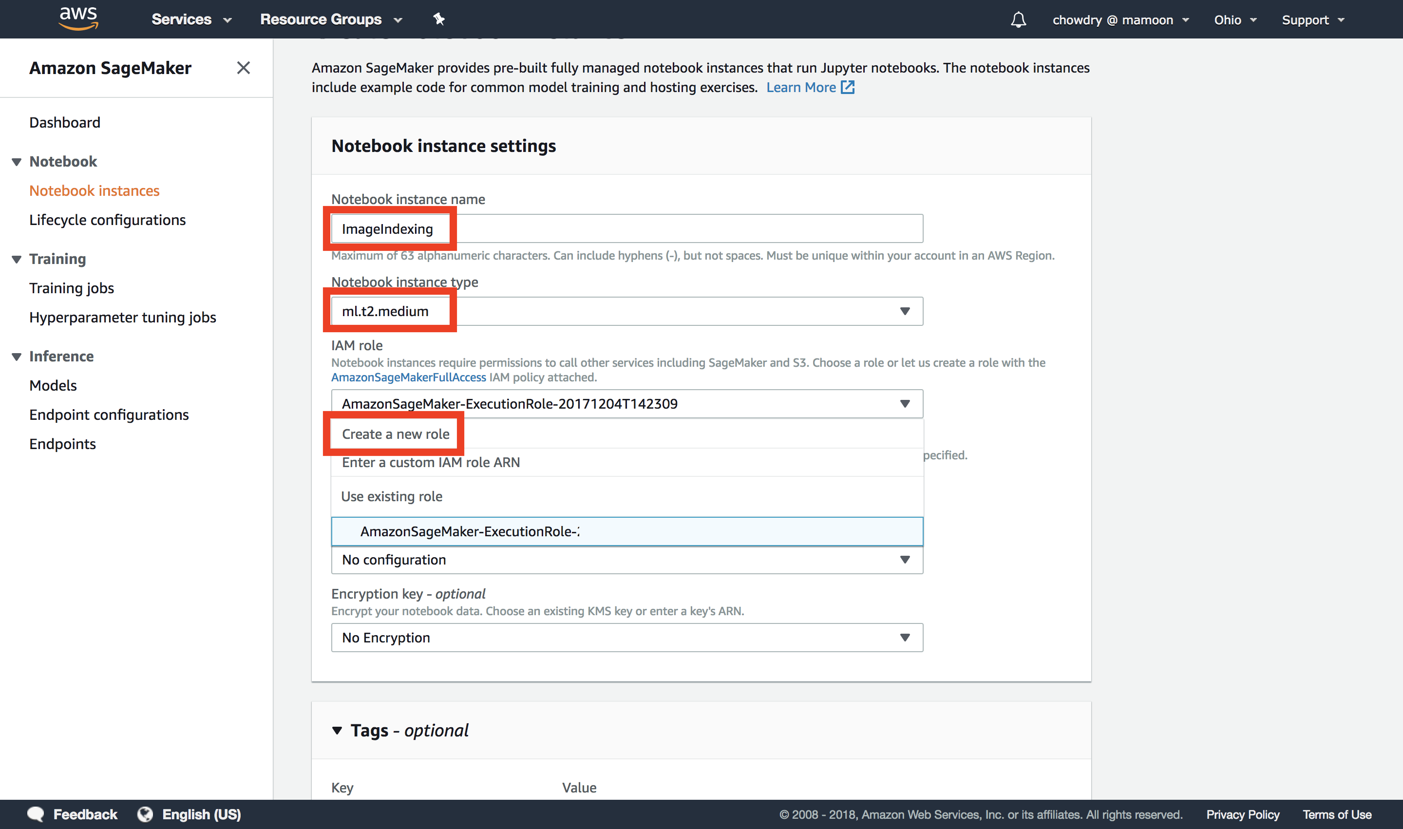 Screenshot of the Amazon SageMaker console showing notebook instance settings with the instance name 'ImageIndexing', instance type 'ml.t2.medium', and the option to create a new IAM role. Used for configuring a new SageMaker notebook instance.