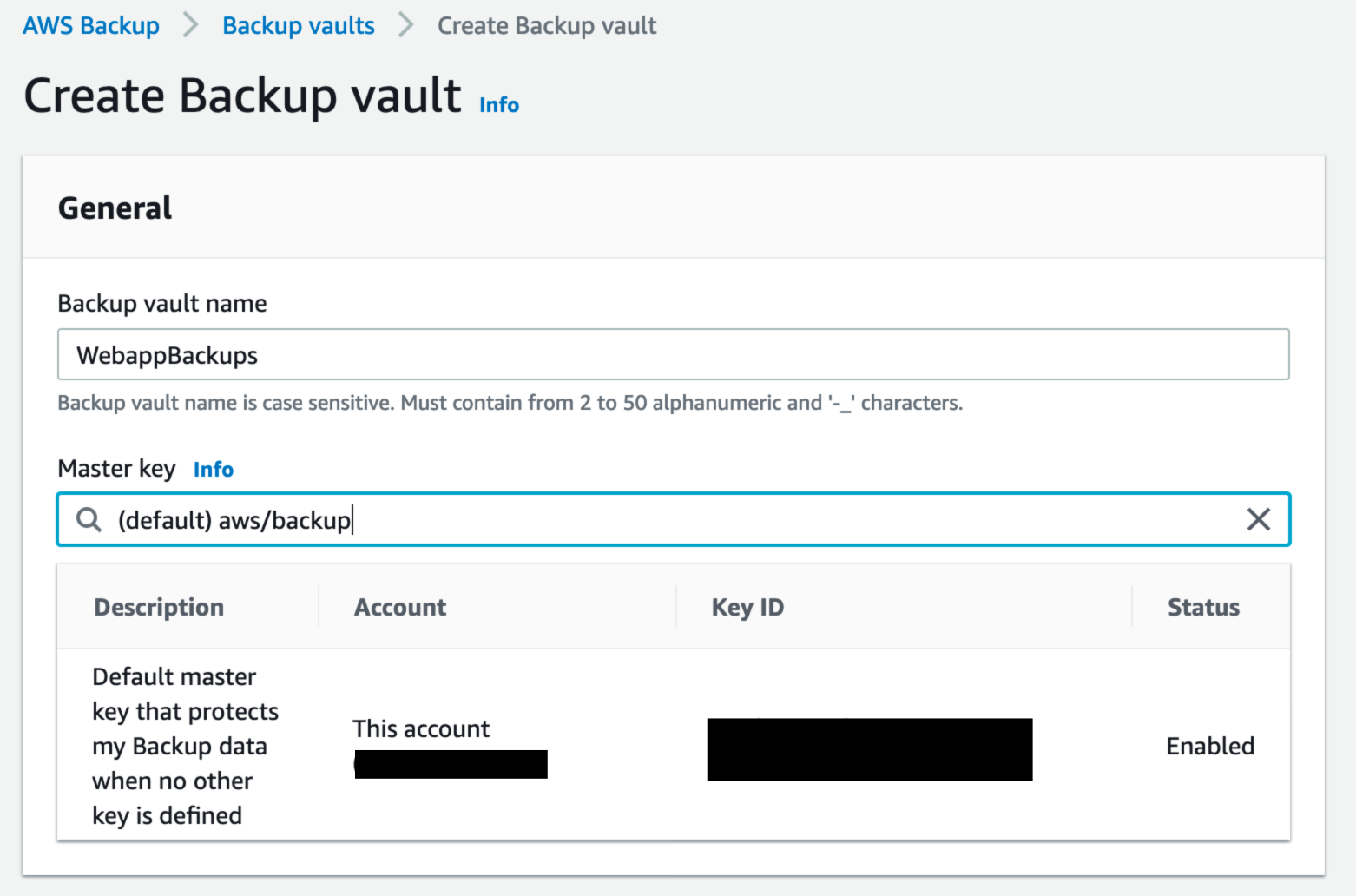 Alt-text: AWS Backup interface showing the "Create Backup Vault" page with fields for vault name and master key, and a table displaying default master key details.