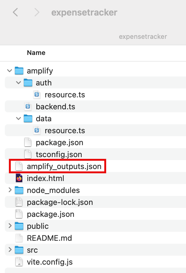 Screenshot showing the file structure of an 'expensetracker' web app project, with the 'amplify_outputs.json' file highlighted in the amplify folder. This image is used in an AWS Amplify deployment tutorial to illustrate where the outputs file is located within a typical project directory.