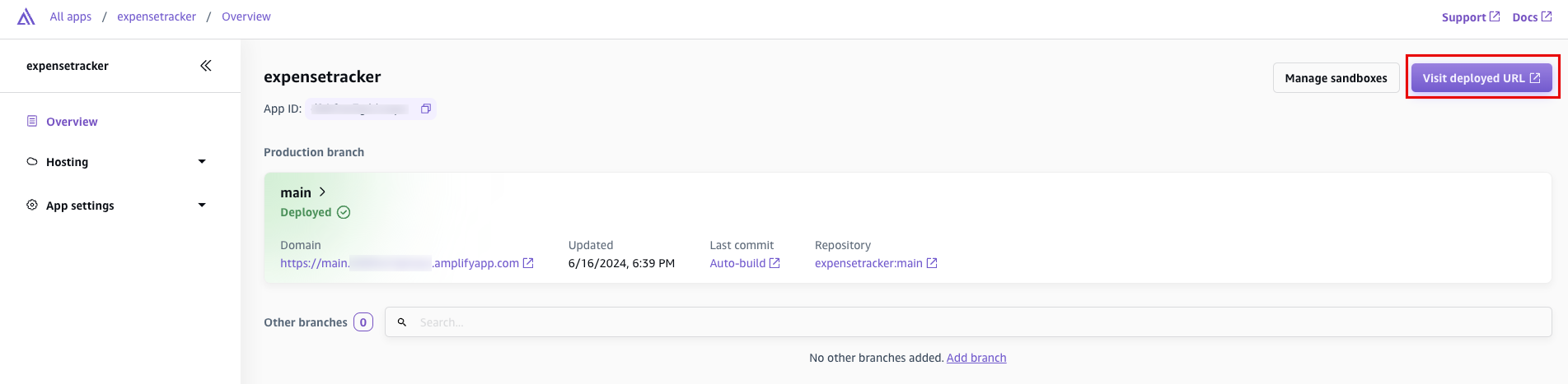 Screenshot of the AWS Amplify console showing the overview page for an expensetracker app after deployment, including production branch status, app domain, repository link, and a highlighted 'Visit deployed URL' button. Used for the tutorial step verifying successful web app deployment.