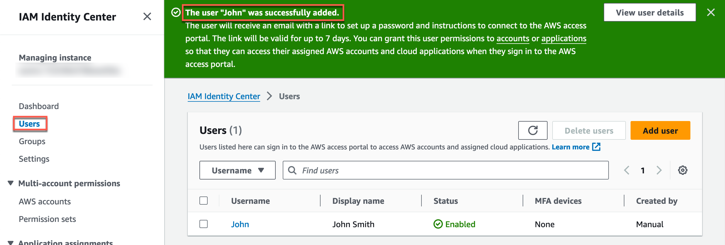 Alt-text: AWS IAM Identity Center interface showing a confirmation message that user "John" was successfully added, with user details listed below.