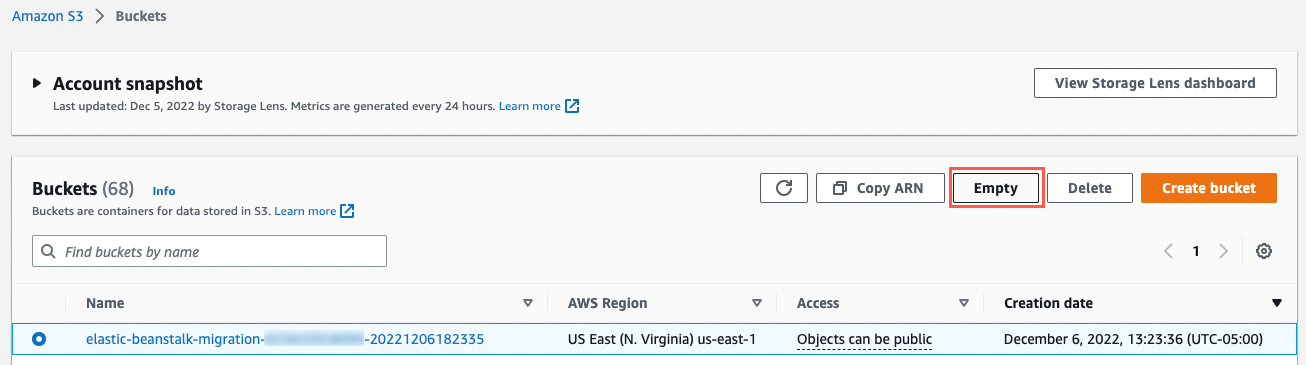 Screenshot of the Amazon S3 console showing the 'Buckets' overview with a selected bucket for elastic beanstalk migration and the 'Empty' button highlighted. This view illustrates an empty S3 bucket in the US East (N. Virginia) region, useful for steps involving the migration of an ASP.NET web application.