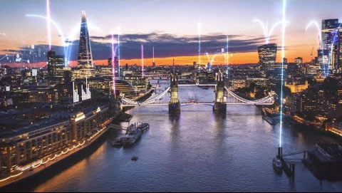 A cityscape of London at sunset featuring Tower Bridge, with digital light trails representing technology and connectivity in the financial services industry.