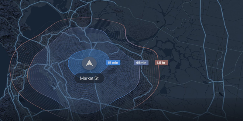 A digital map visualization showing Market St and drive-time contours at 15 minutes, 45 minutes, and 1.5 hours, highlighting connected vehicle data using Mapbox and AWS technology.
