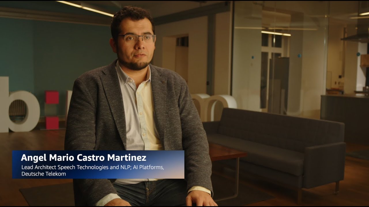 YouTube video thumbnail showing Angel Mario Castro Martinez, Lead Architect Speech Technologies and NLP; AI Platforms at Deutsche Telekom, seated for an interview in a modern office setting.
