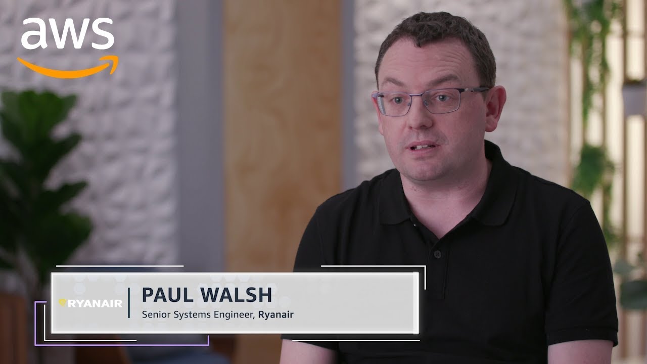 Text overlay reads "Paul Walsh, Senior Systems Engineer, Ryanair" with an AWS logo in the top-left corner.
