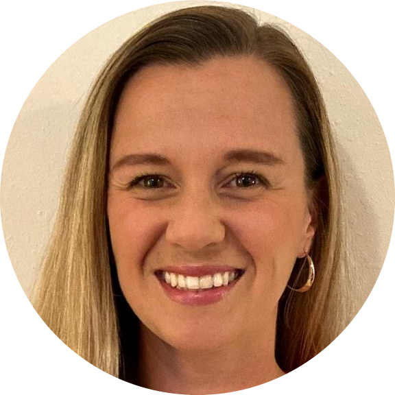 Headshot image of a smiling woman with straight blonde hair