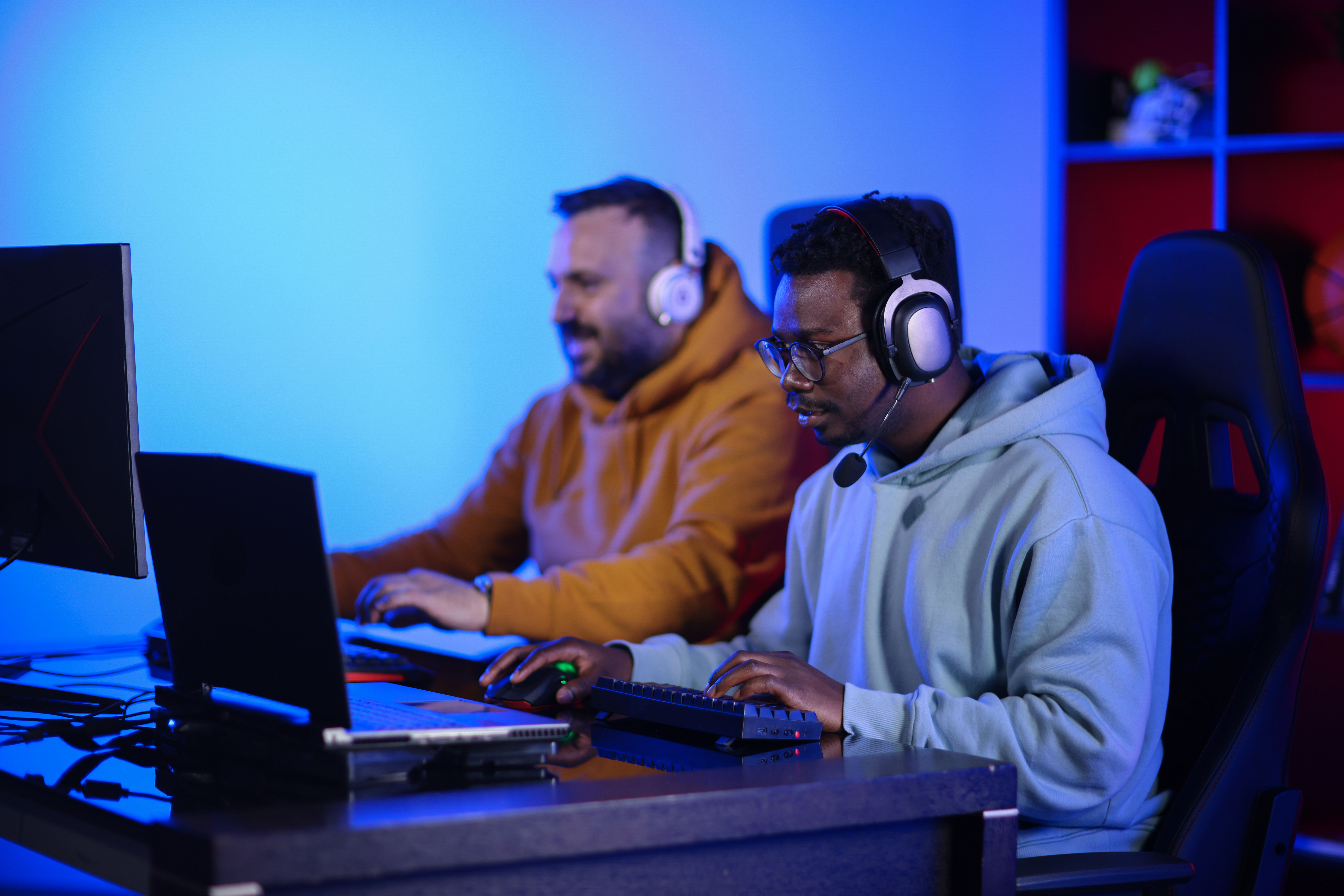 Two friends playing video games