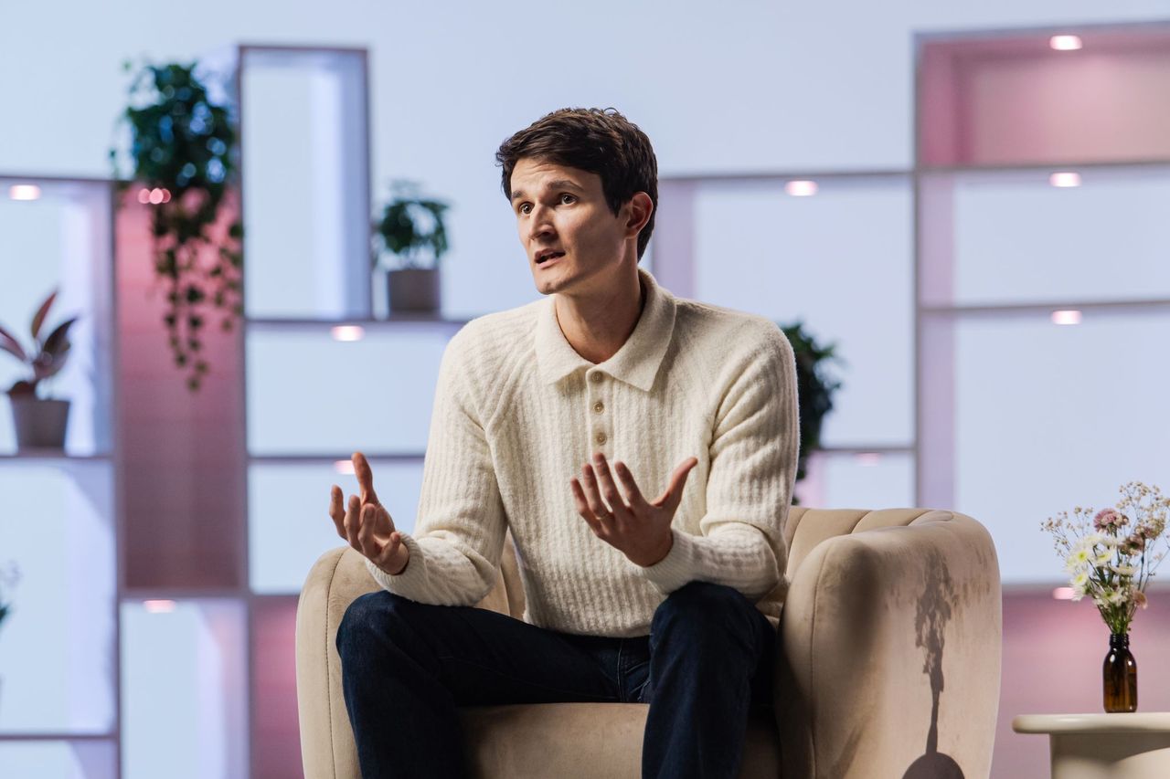 Man being interviewed