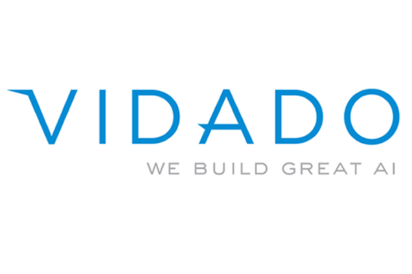 Logo for Vidado featuring the tagline 'We Build Great AI' in blue font on a white background.