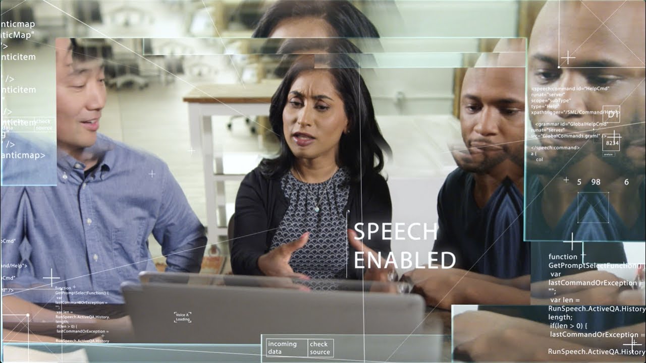 A diverse group of people collaborating at a laptop with digital overlays and code, representing AI and speech-enabled technology.